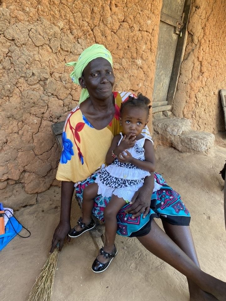 Mom with daughter on lap